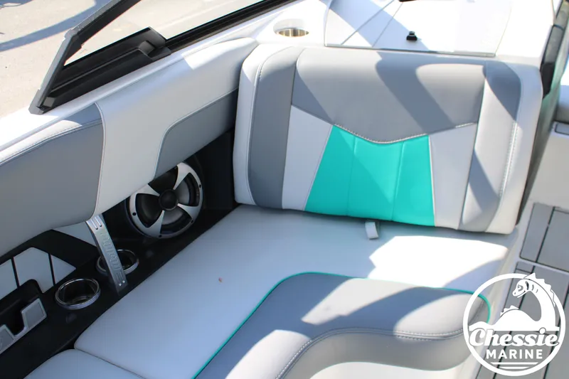 Slide: The Image of Interior of 2020 Malibu Wakesetter 23 MXZ with gray and turquoise seating. - 17
