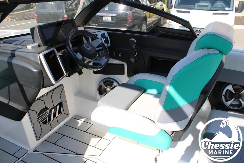 Slide: The Image of Interior of 2020 Malibu Wakesetter 23 MXZ with modern helm. - 18
