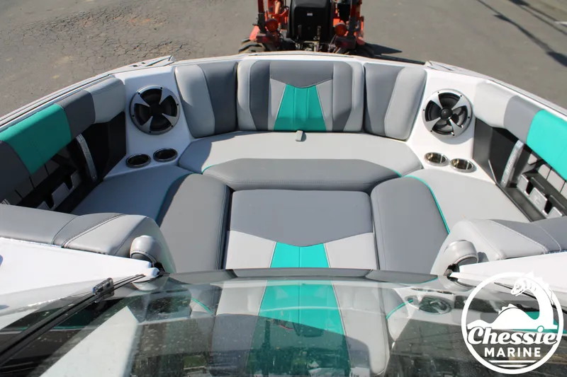 Slide: The Image of Interior of 2020 Malibu Wakesetter 23 MXZ with gray and teal seating. - 20