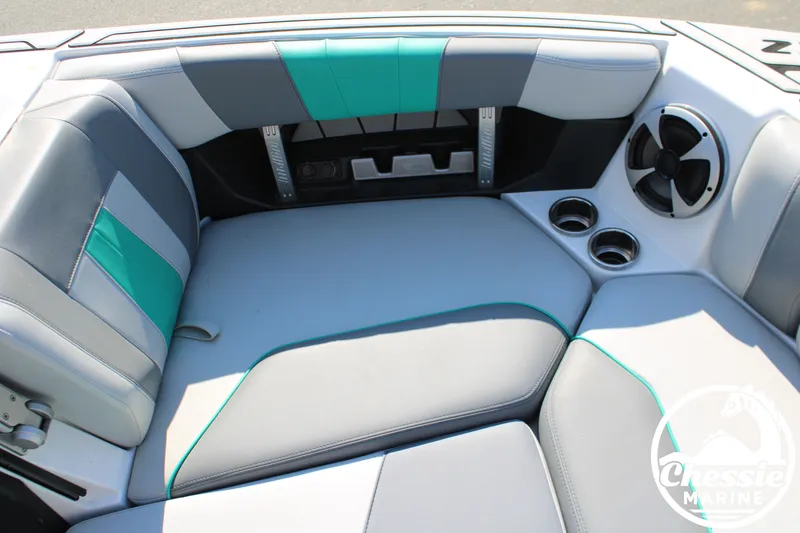 Slide: The Image of Interior of 2020 Malibu Wakesetter 23 MXZ with gray and green seating. - 21
