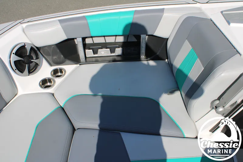 Slide: The Image of Interior of 2020 Malibu Wakesetter 23 MXZ with gray and turquoise seating. - 22