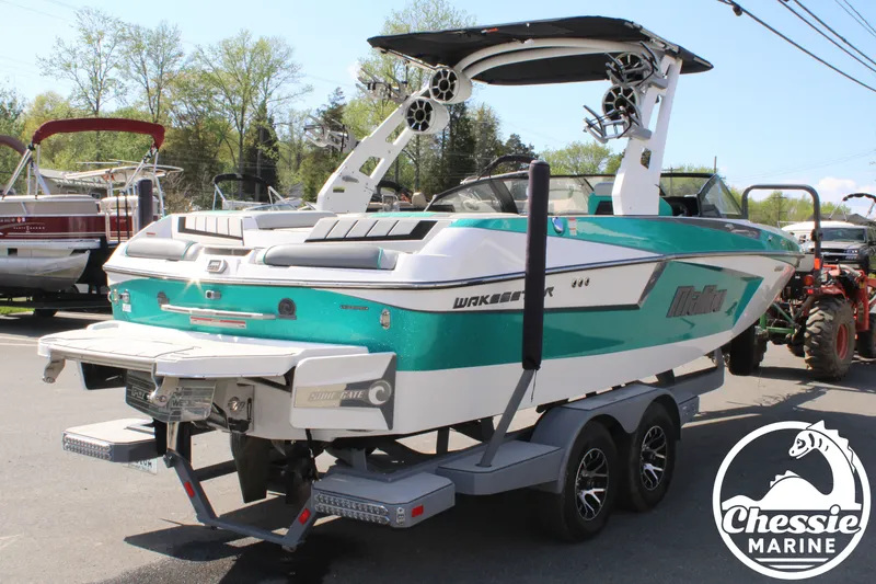 Slide: The Image of 2020 Malibu Wakesetter 23 MXZ boat on trailer, side view. - 5