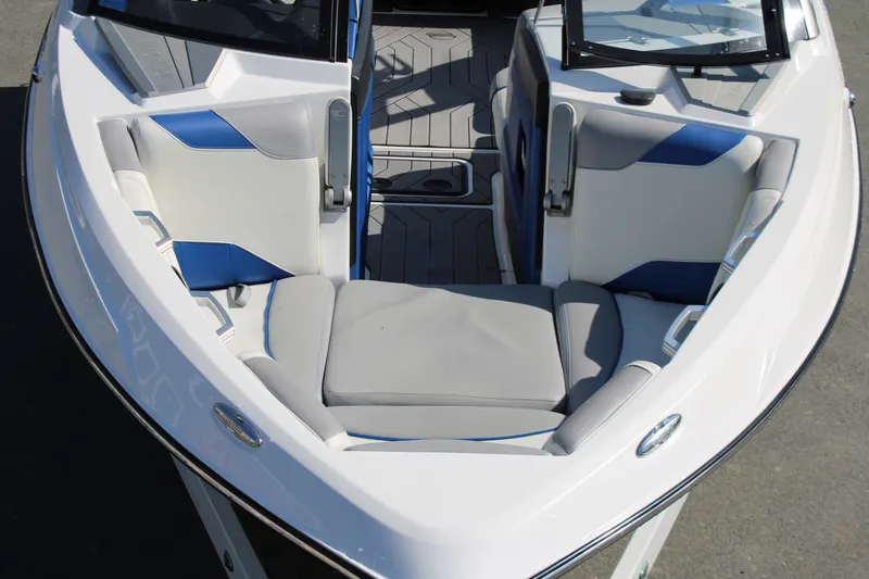 Slide: The Image of Interior of 2018 Malibu Wakesetter 23 LSV with gray and blue seating. - 9