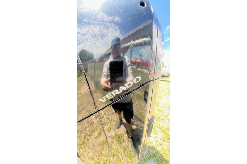Slide: The Image of Reflection on a 2019 Sea Ray SDX 250 Outboard with Verado engine. - 20