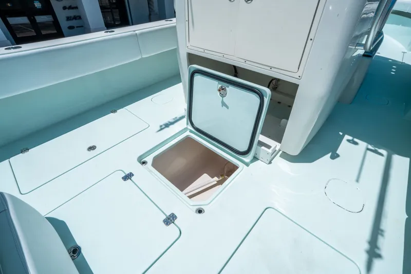 Slide: The Image of Open storage compartment on a 2020 Andros 32 Offshore boat. - 13