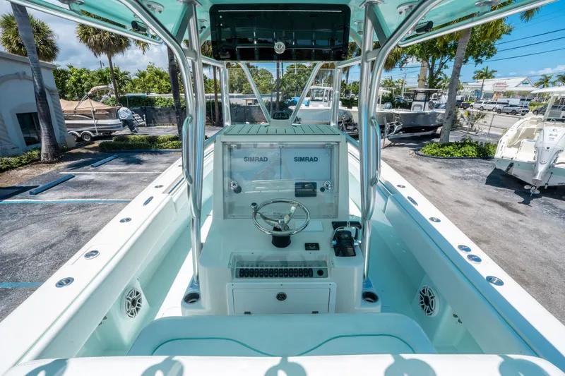Slide: The Image of Interior view of a 2020 Andros 32 Offshore boat in the marina. - 17
