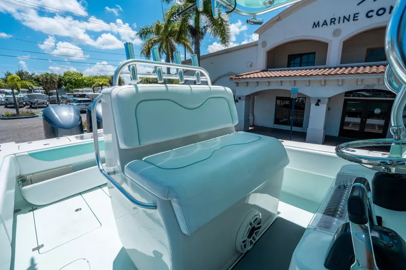 Slide: The Image of Andros 32 Offshore 2020 boat in front of a marine store. - 19