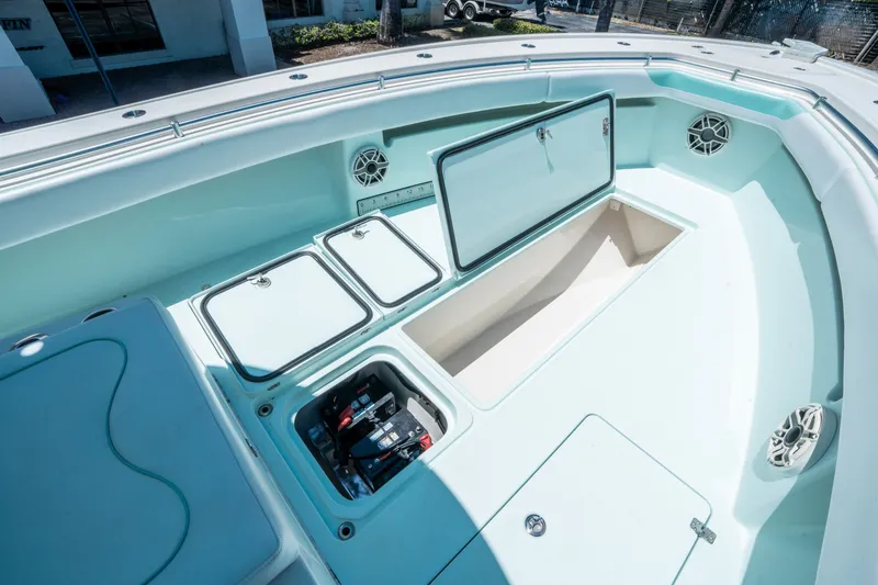 Slide: The Image of Andros 32 Offshore 2020 boat with storage compartments and speakers. - 24