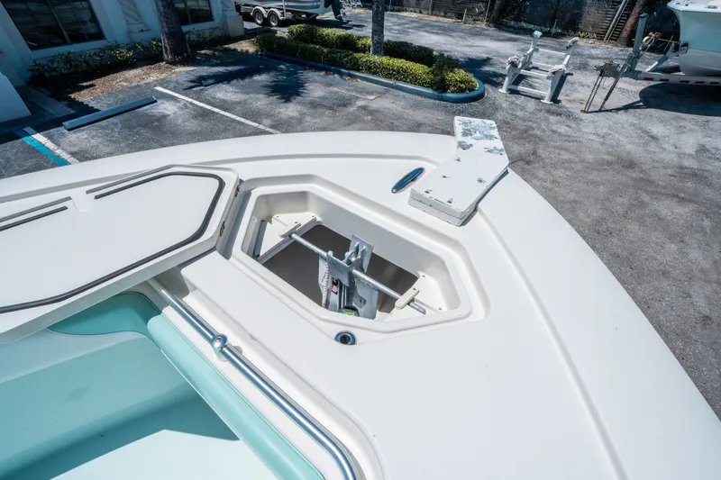 Slide: The Image of Andros 32 Offshore 2020 with anchor compartment on deck. - 25