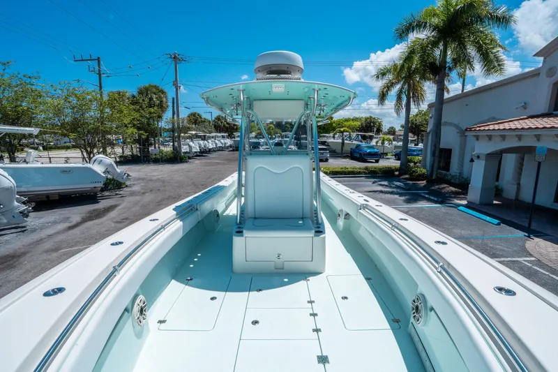 Slide: The Image of Andros 32 Offshore 2020 boat on parking lot under sunny skies. - 26
