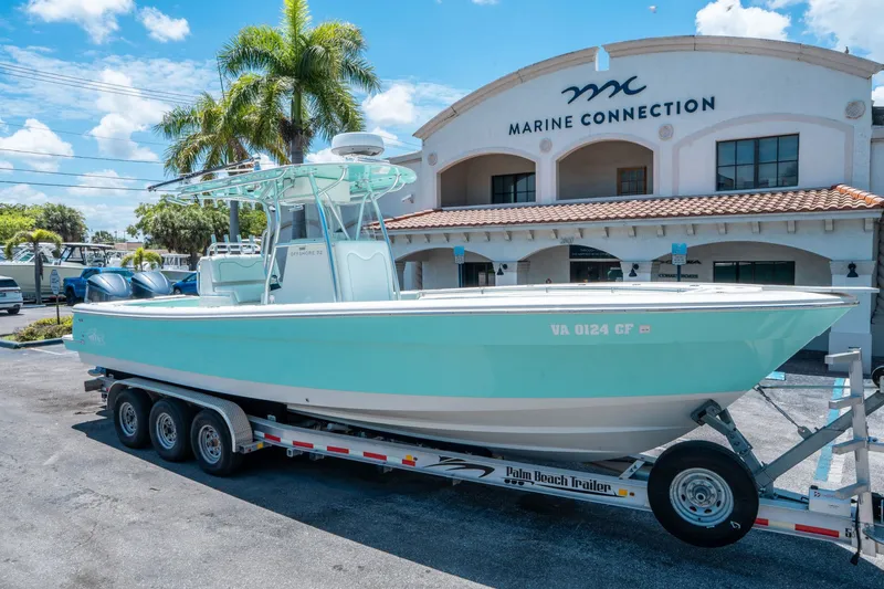 Slide: The Image of Andros 32 Offshore 2020 on trailer at Marine Connection. - 8