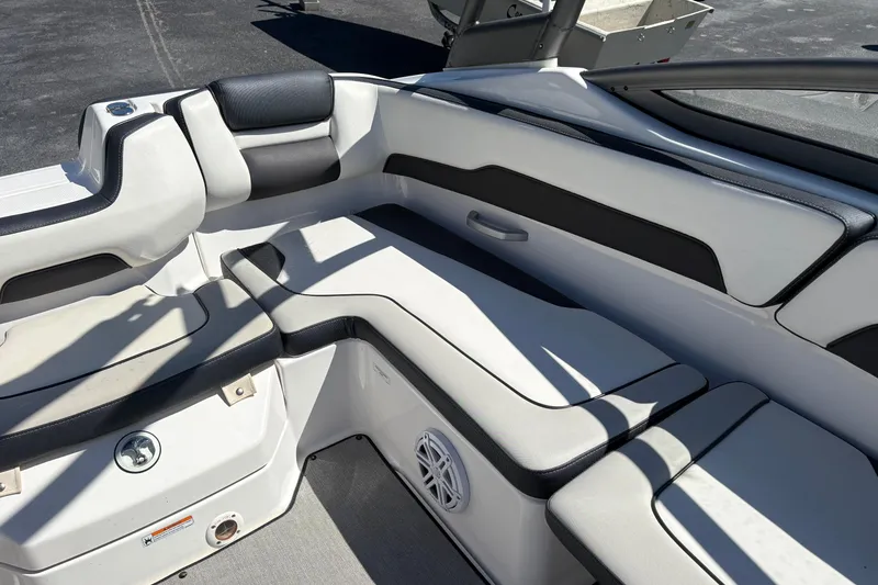 Slide: The Image of 2021 Yamaha Boats AR195 interior seating with sleek, modern design and comfortable upholstery. - 12