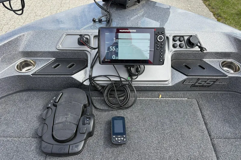Slide: The Image of 2023 Ranger 2050MS boat dashboard with Humminbird fish finder and control panel. - 11