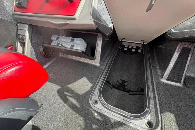 Slide: The Image of Interior of 2023 Ranger 2050MS boat showing storage compartments and seating. - 19