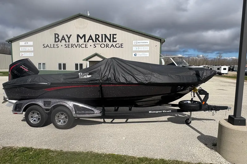 Slide: The Image of 2023 Ranger 2050MS boat on trailer at Bay Marine sales and service location. - 5
