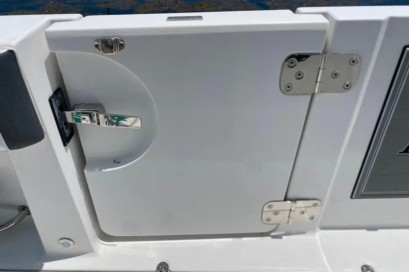 Slide: The Image of 2022 Blackfin 332 CC boat door with stainless steel latch and hinges. - 29