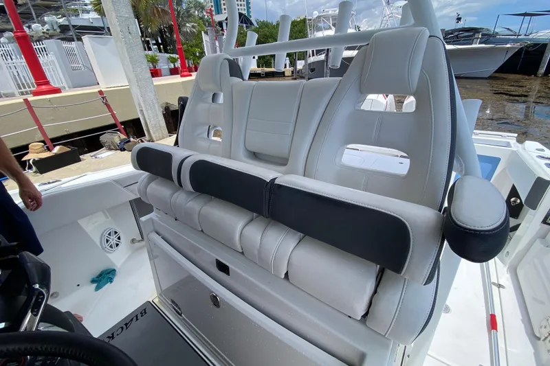 Slide: The Image of 2022 Blackfin 332 CC boat interior with luxurious seating and modern design. - 12