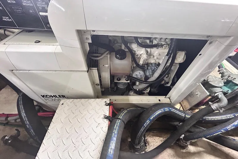 Slide: The Image of Engine compartment of 2001 Cruisers Yachts 3750 Motoryacht with Kohler generator. - 10