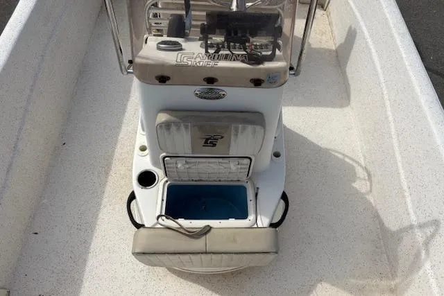Slide: The Image of 2019 Carolina Skiff 218 DLV boat console with seating and storage. - 11