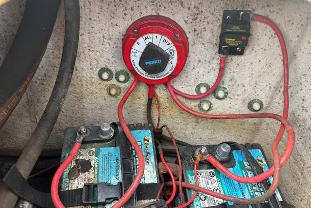 Slide: The Image of Battery setup in a 2019 Carolina Skiff 218 DLV with Perko switch and wiring. - 12