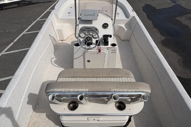Slide: The Image of 2019 Carolina Skiff 218 DLV boat interior with Garmin navigation system and seating. - 5
