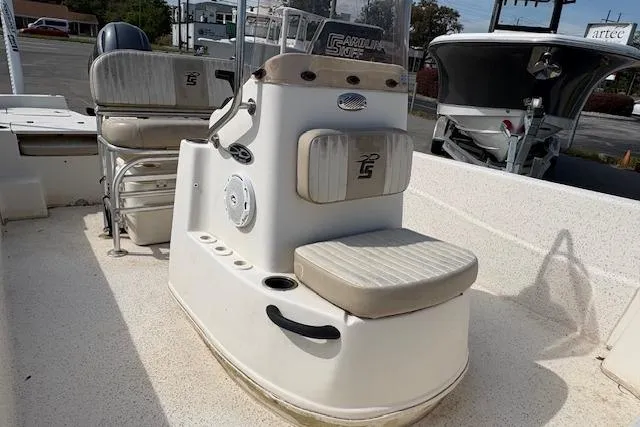 Slide: The Image of 2019 Carolina Skiff 218 DLV boat interior with seating and console. - 9