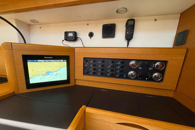 Slide: The Image of Navigation and control panel of a 2018 Jeanneau 58 yacht with Raymarine display. - 17