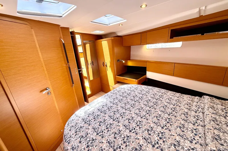 Slide: The Image of Luxurious interior of 2018 Jeanneau 58 yacht with wood finish and skylights. - 19