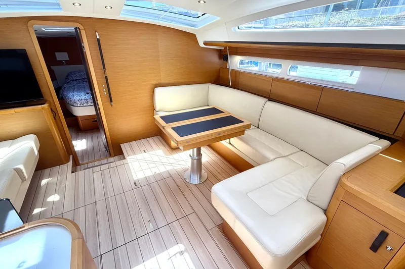 Slide: The Image of Luxurious interior of 2018 Jeanneau 58 yacht with elegant seating and modern design. - 2