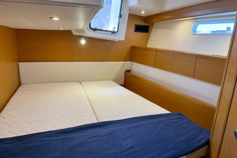 Slide: The Image of Luxurious cabin interior of 2018 Jeanneau 58 yacht with cozy bedding and modern design. - 22