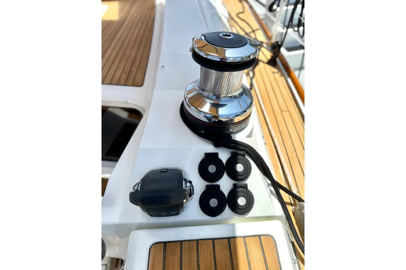 Slide: The Image of Deck equipment on a 2018 Jeanneau 58 yacht, featuring winch and control buttons. - 30