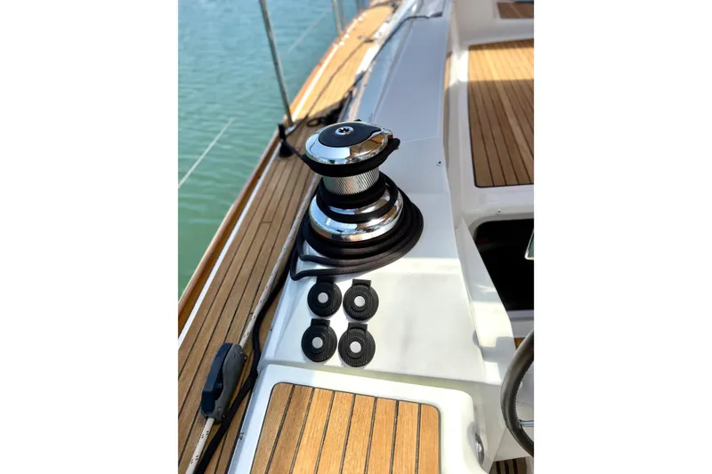 Slide: The Image of Deck of 2018 Jeanneau 58 yacht with winch and teak flooring. - 31
