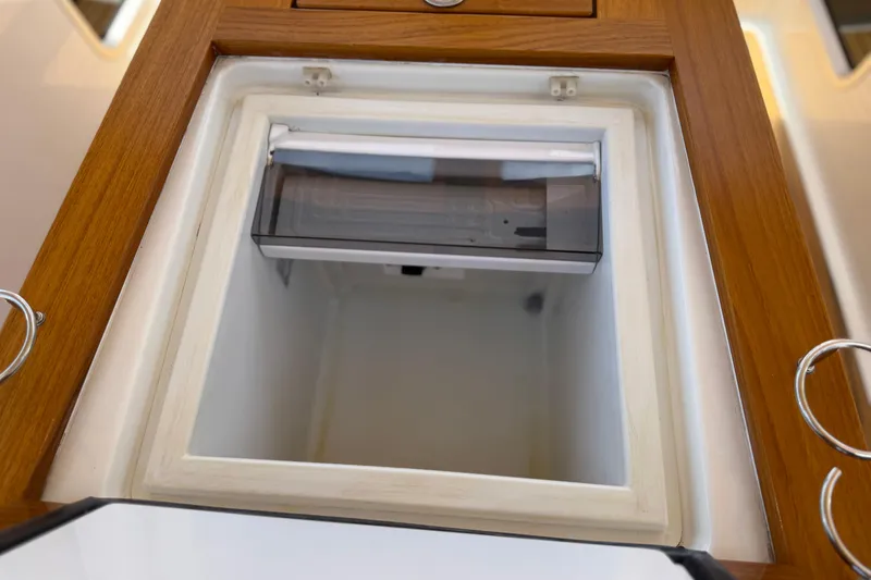Slide: The Image of Interior view of a 2018 Jeanneau 58 yacht's built-in storage compartment. - 34