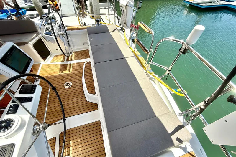 Slide: The Image of Cockpit of 2018 Jeanneau 58 yacht with teak flooring and modern navigation equipment. - 35