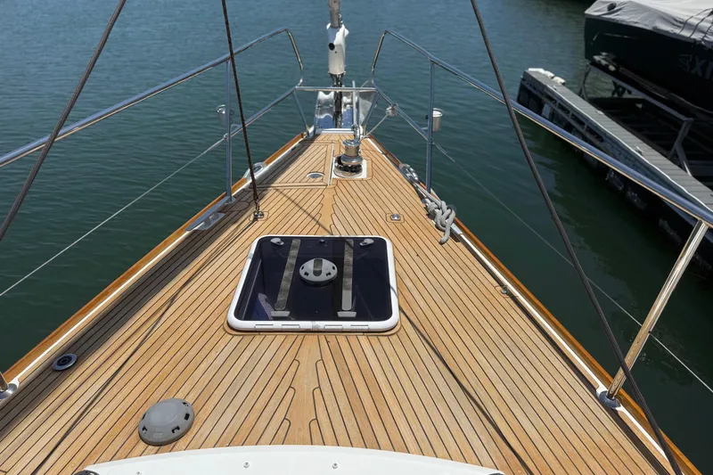 Slide: The Image of Deck view of 2018 Jeanneau 58 yacht with teak finish and hatch. - 42