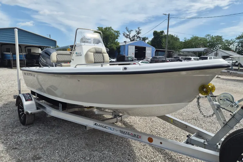 The Image of 2026 Key West 1720 Center Console boat on trailer in outdoor setting. - 1