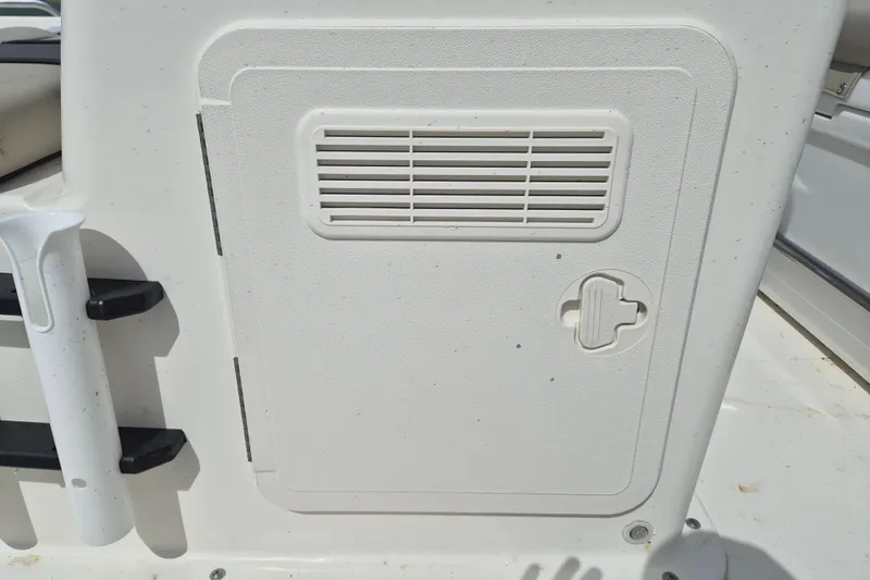 Slide: The Image of 2026 Key West 1720 Center Console boat hatch with vent and latch. - 10