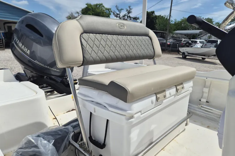 Slide: The Image of 2026 Key West 1720 Center Console boat with Yamaha engine and cushioned seating. - 6
