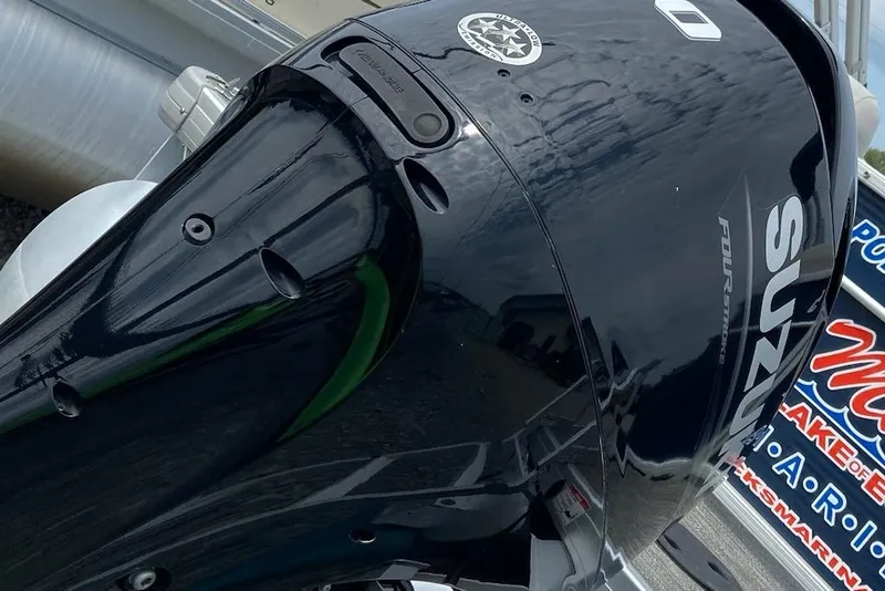 Slide: The Image of Suzuki four-stroke outboard motor on a 2021 Godfrey Sweetwater 2286 SBX pontoon boat. - 8