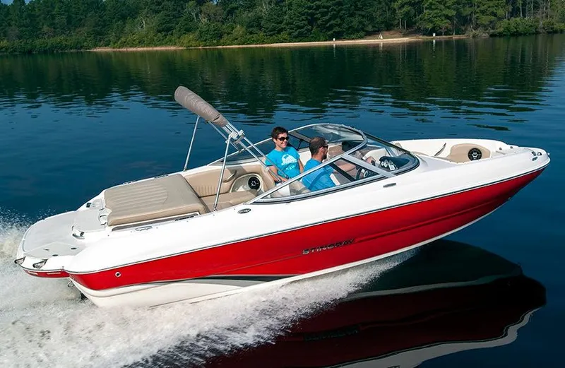 The Image of Manufacturer Provided Image: 2015 Stingray 208 LR boat cruising on a lake. - 1