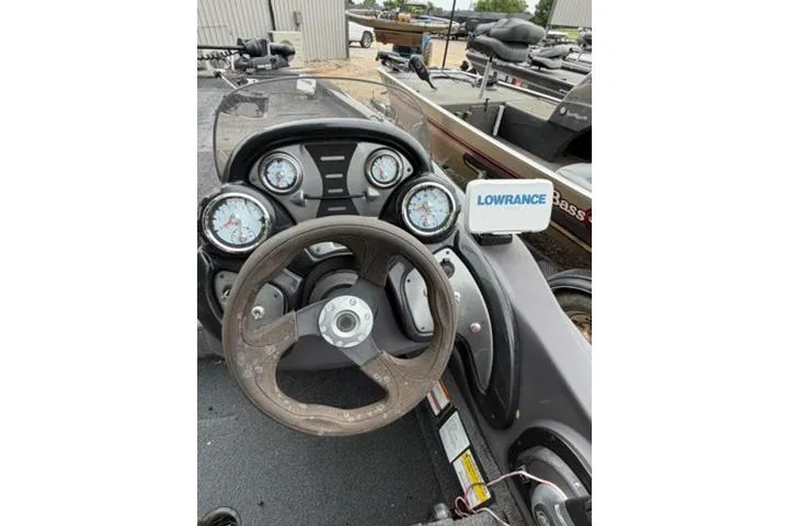 Slide: The Image of 2019 Tracker Pro Team 175 TXW dashboard with steering wheel and Lowrance fish finder. - 3