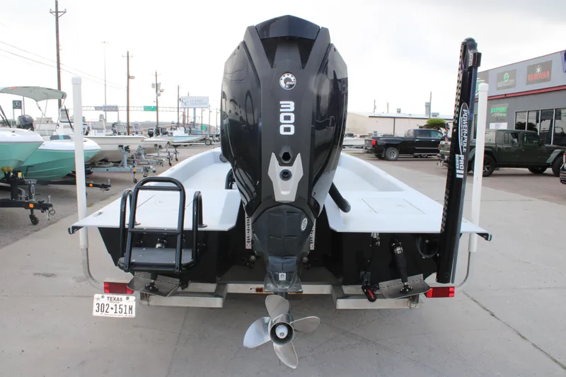 Slide: The Image of 2019 JH Performance Outlaw 230 boat with powerful 300 HP engine, rear view. - 12