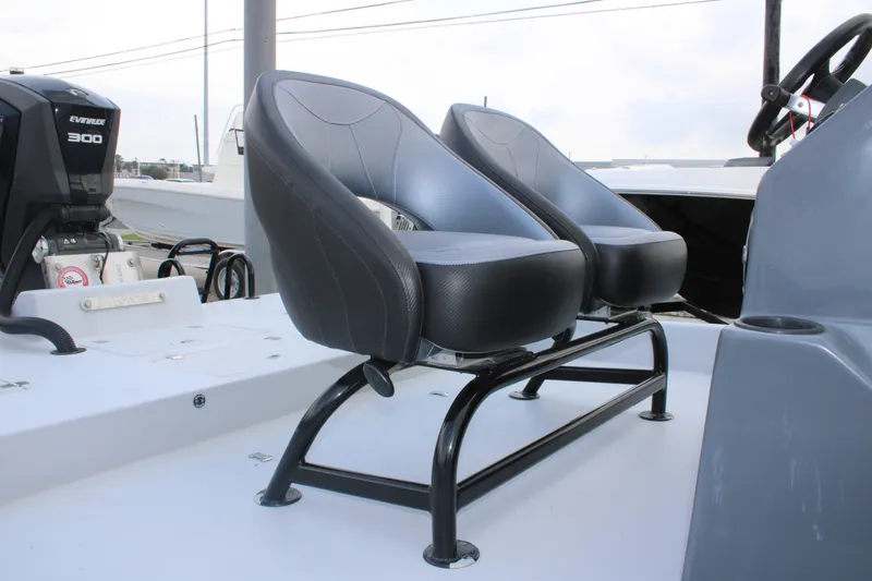 Slide: The Image of 2019 JH Performance Outlaw 230 boat seats with Evinrude 300 engine in background. - 19