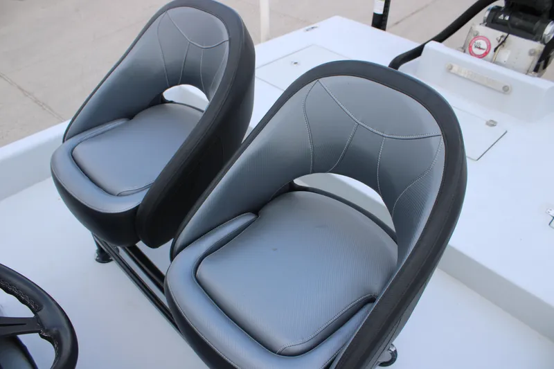 Slide: The Image of 2019 JH Performance Outlaw 230 boat seats, featuring sleek gray upholstery. - 20