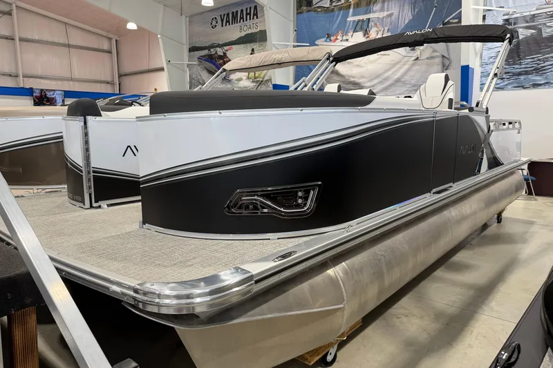 The Image of 2026 Avalon 2385 25 LSZ VRB pontoon boat displayed indoors. - 0