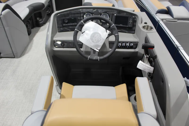 Slide: The Image of 2026 Avalon 2385 25 LSZ VRB boat cockpit with modern steering and controls. - 15