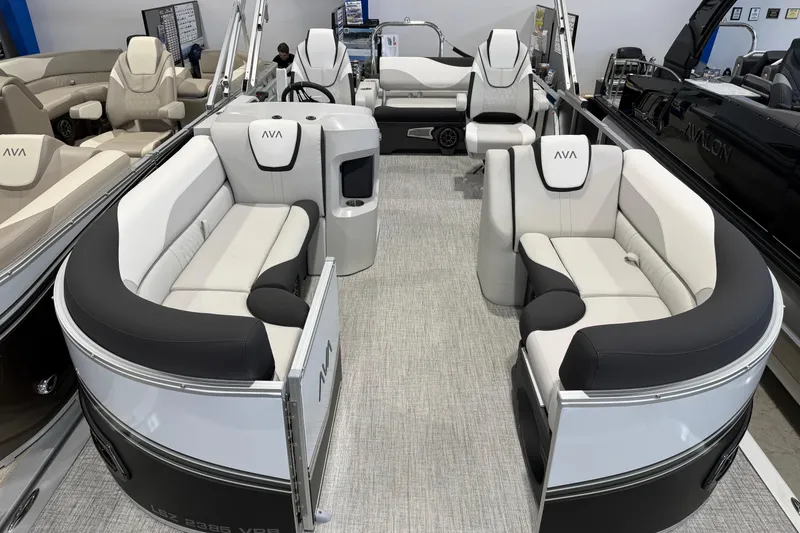 Slide: The Image of 2026 Avalon 2385 25 LSZ VRB pontoon boat with luxurious seating and modern design. - 2