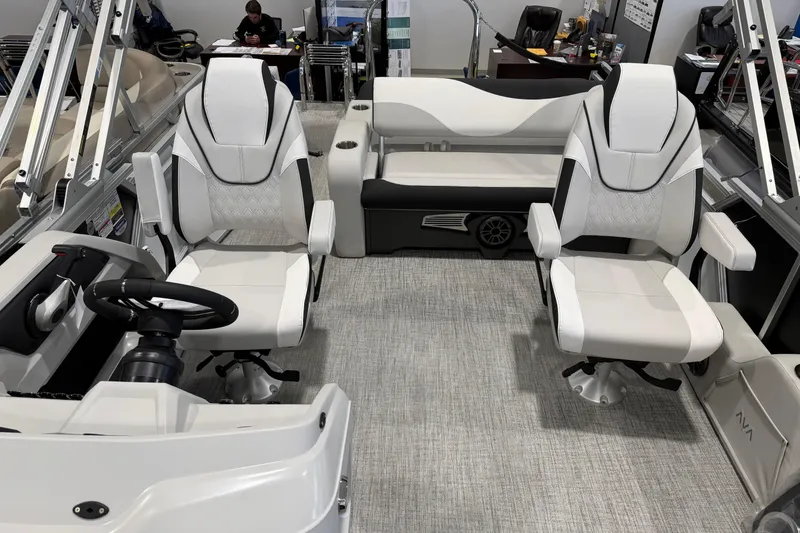 Slide: The Image of Interior of 2026 Avalon 2385 25 LSZ VRB boat with modern seating and steering wheel. - 3