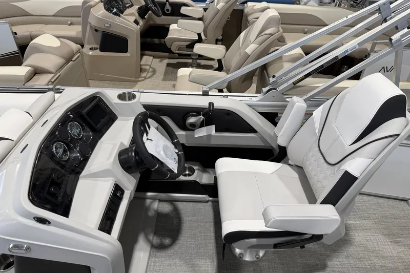 Slide: The Image of 2026 Avalon 2385 25 LSZ VRB boat interior with modern helm and seating. - 4
