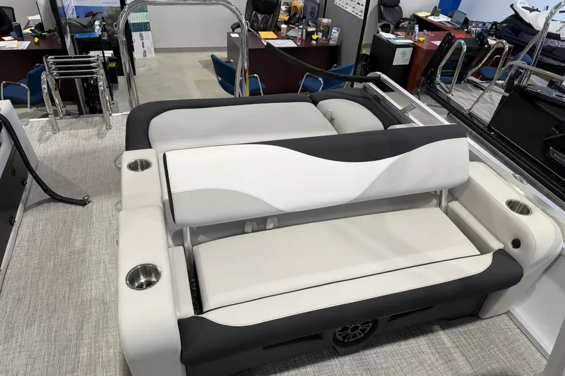 Slide: The Image of 2026 Avalon 2385 25 LSZ VRB boat interior with sleek seating and cup holders. - 6